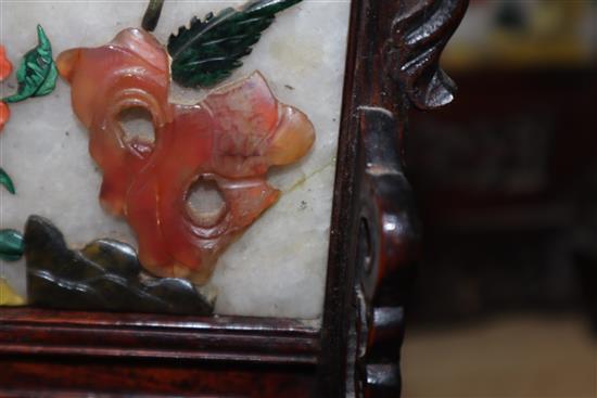 A pair of Chinese hardstone and coral table screens with hongmu stands, early 20th century, Total height 27cm